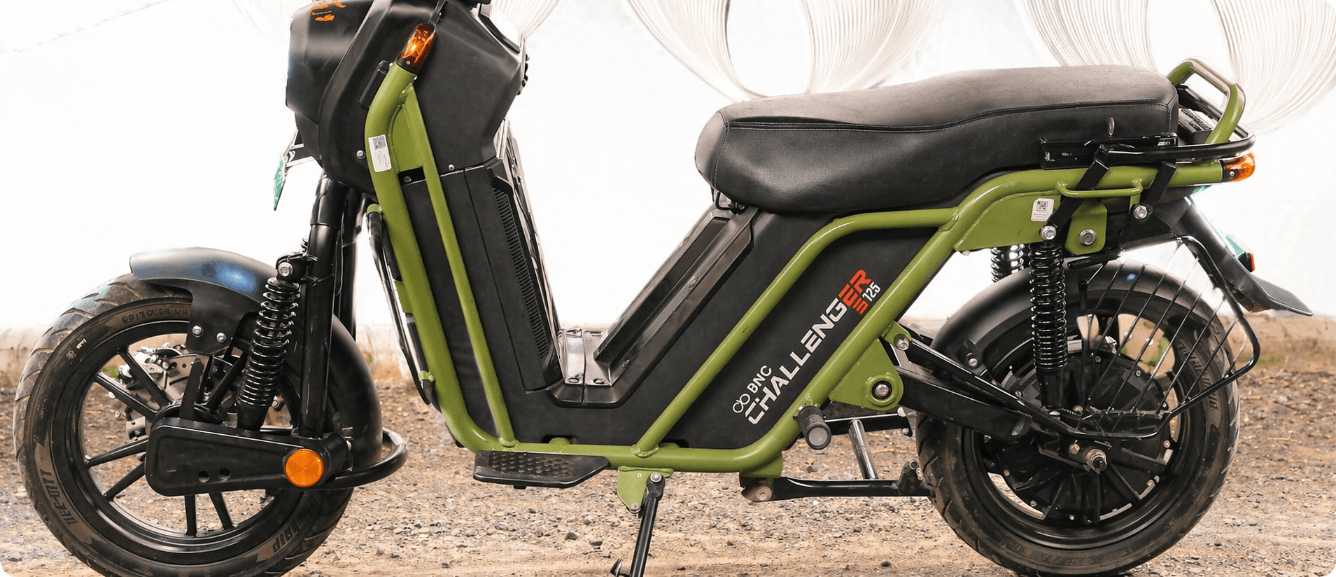 BNC Challenger 125 – dramatic army-green studio profile